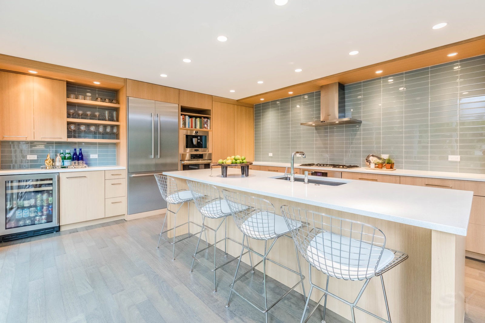 LivCo kitchen renovation large marble island grey flooring recess lighting light cabinetry