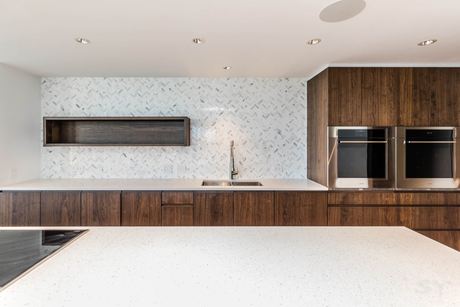 kitchen renovation geometric backsplash large countertop & island double oven