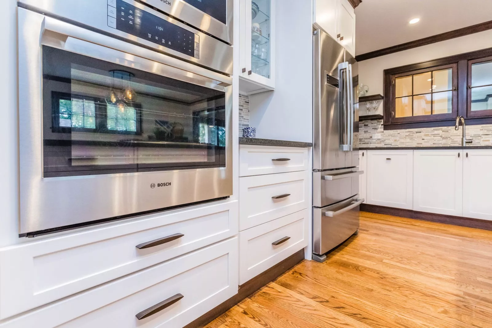 livco kitchen remodel white cabinets stainless steel appliances hardwood flooring