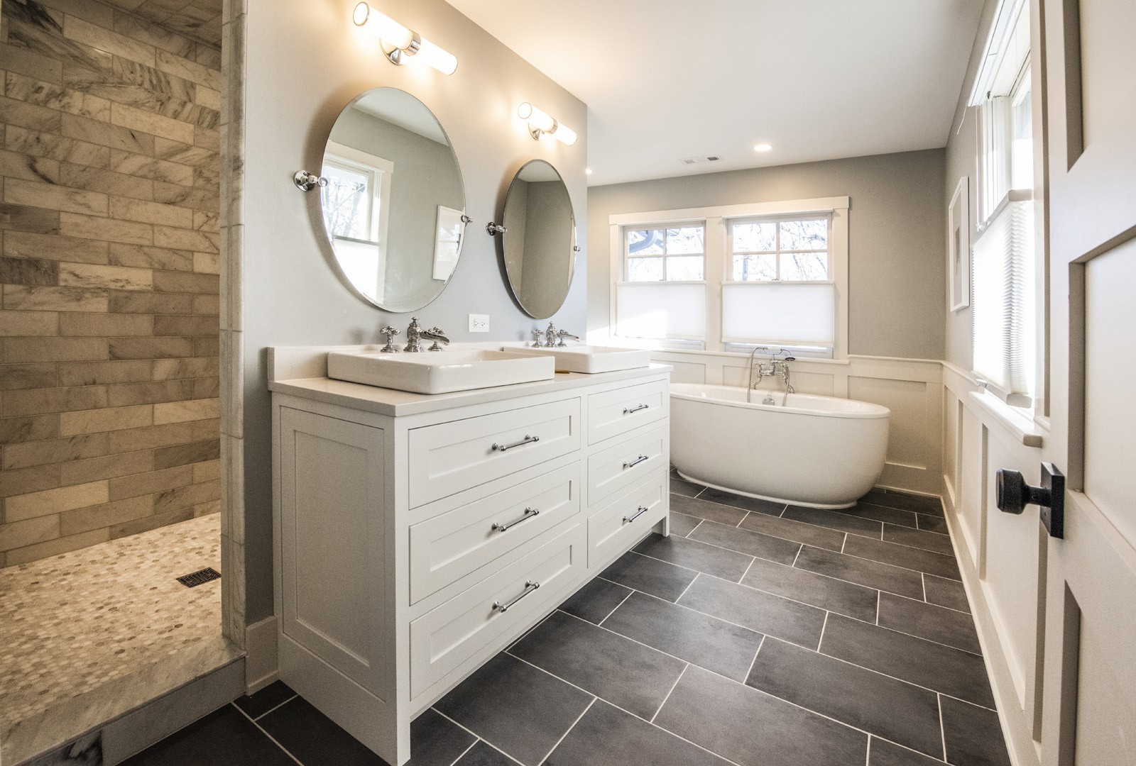 livco bathroom remodel grey tile flooring white double vanity vessel sinks garden tub & open shower