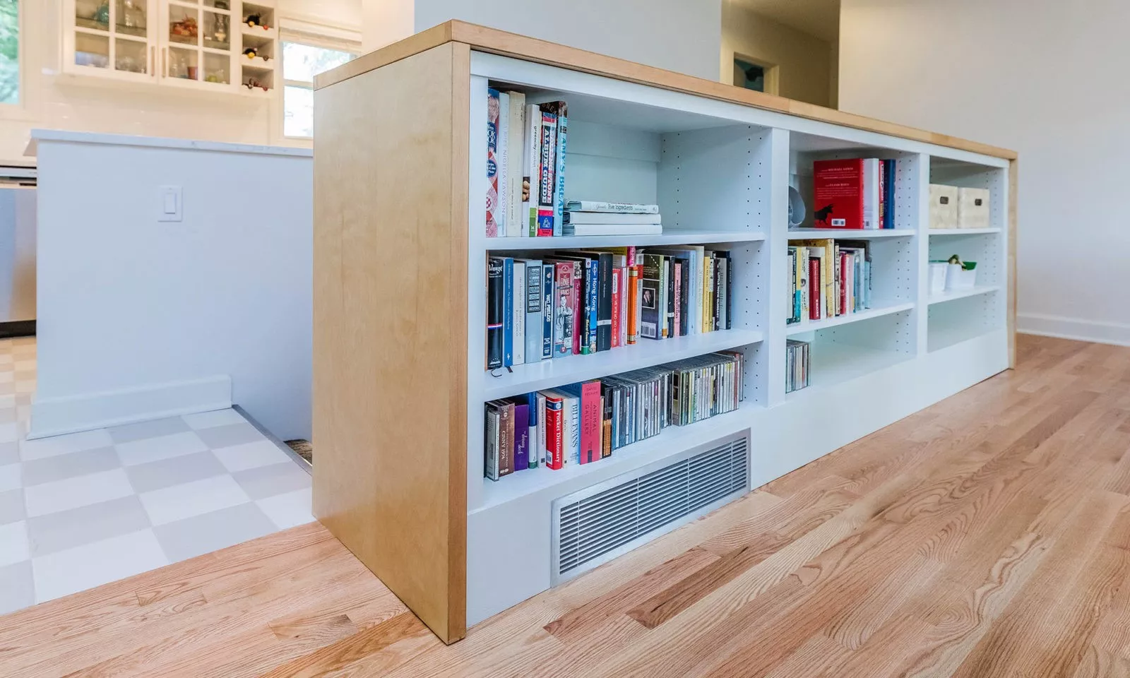 mid century modern ranch renovation and remodel view of detail of open shelf room divider and return air vent