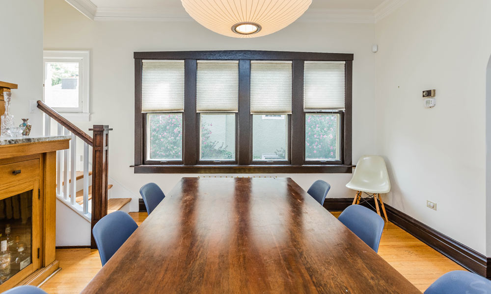 vintage dining room remodel with craftsman window casing in dark stain