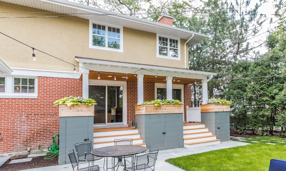 view of covered back porch in a two story addition in riverside illinois