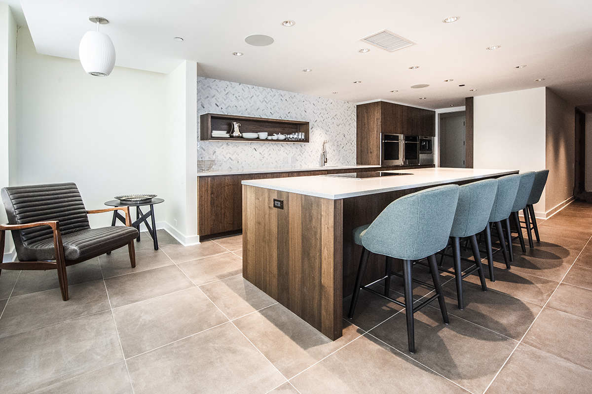Newly renovated white and dark wood kitchen with kitchen island