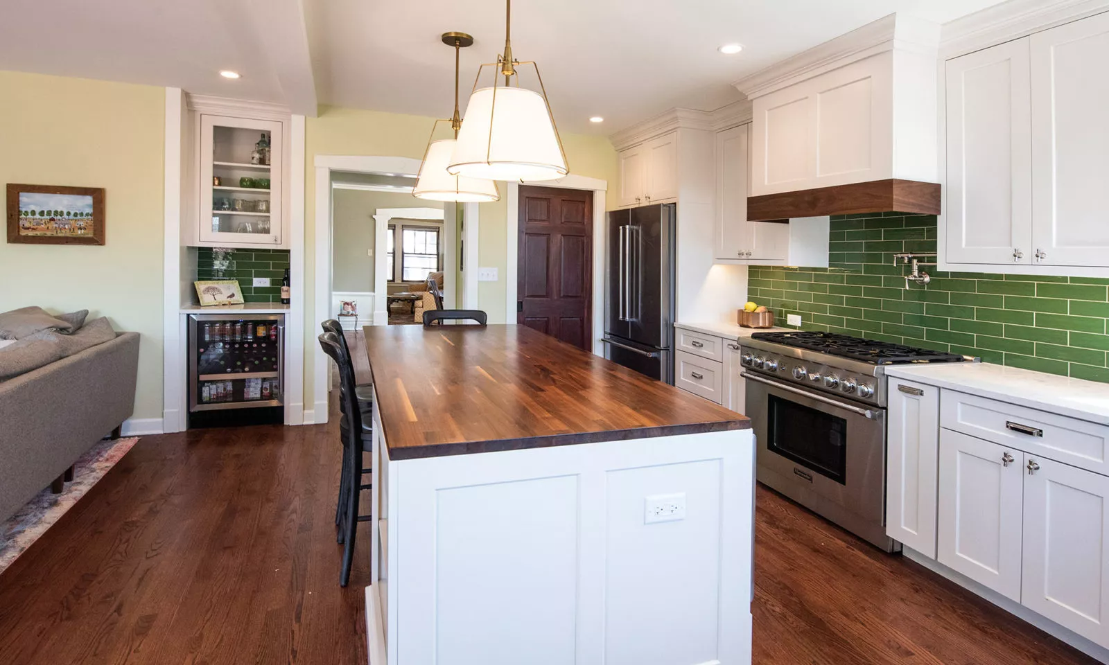 view of finished kitchen with dark butcher block island countertop