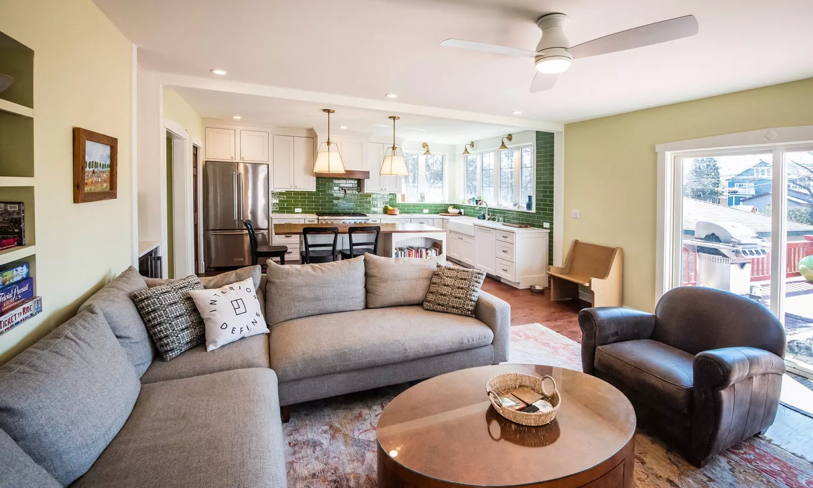 view of family room with kitchen beyond