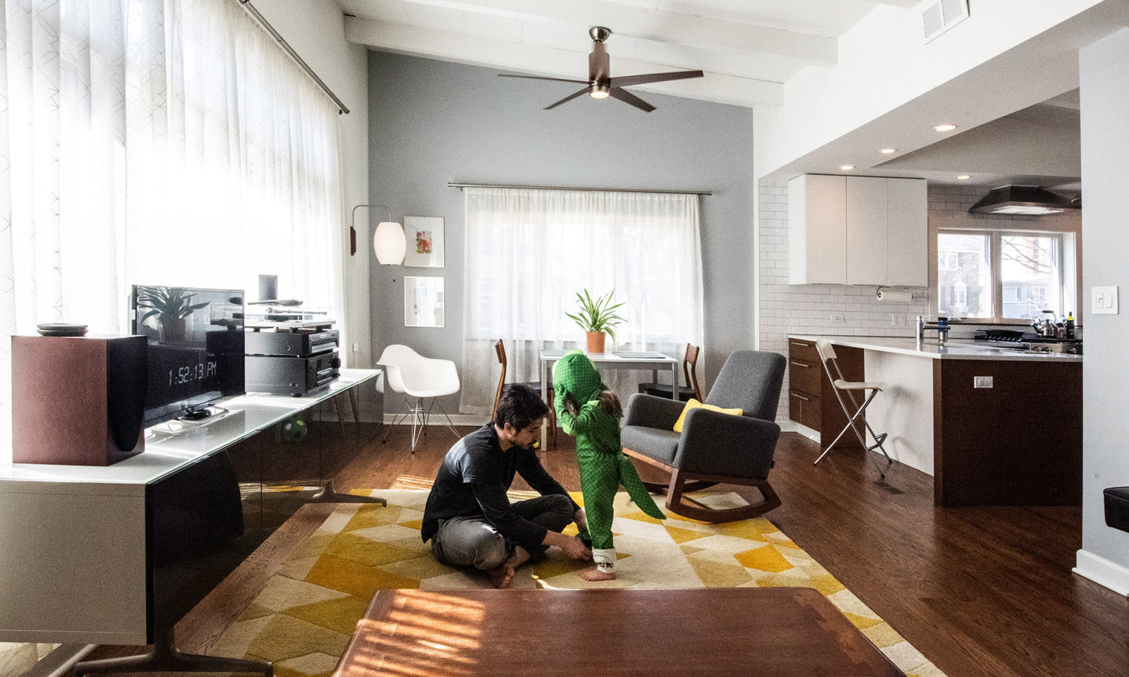 the family plating in the new open and bright family room