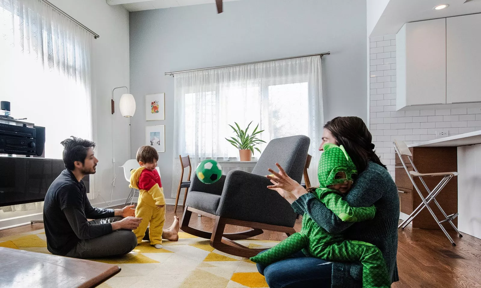 the family playing in the new open modern family room