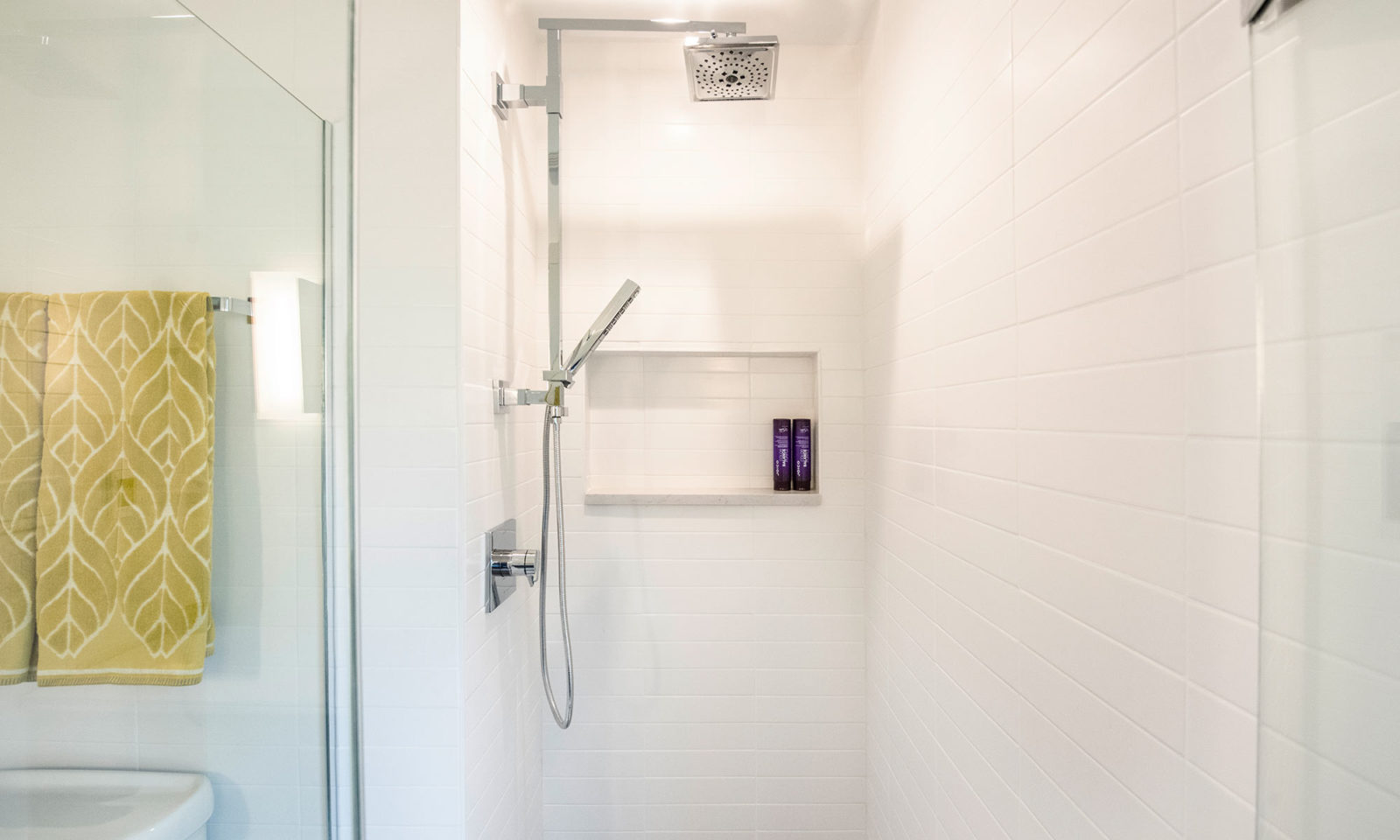 Riverside Illinois bathroom remodel shower niche with white stacked tile