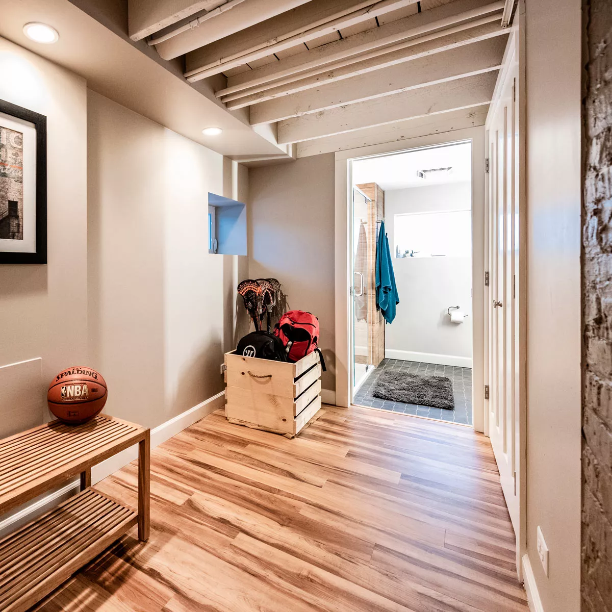 view of basement rec room looking towards bathroom