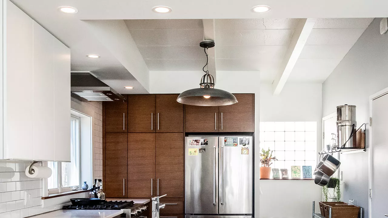 zoom background of a modern kitchen with walnut cabinets
