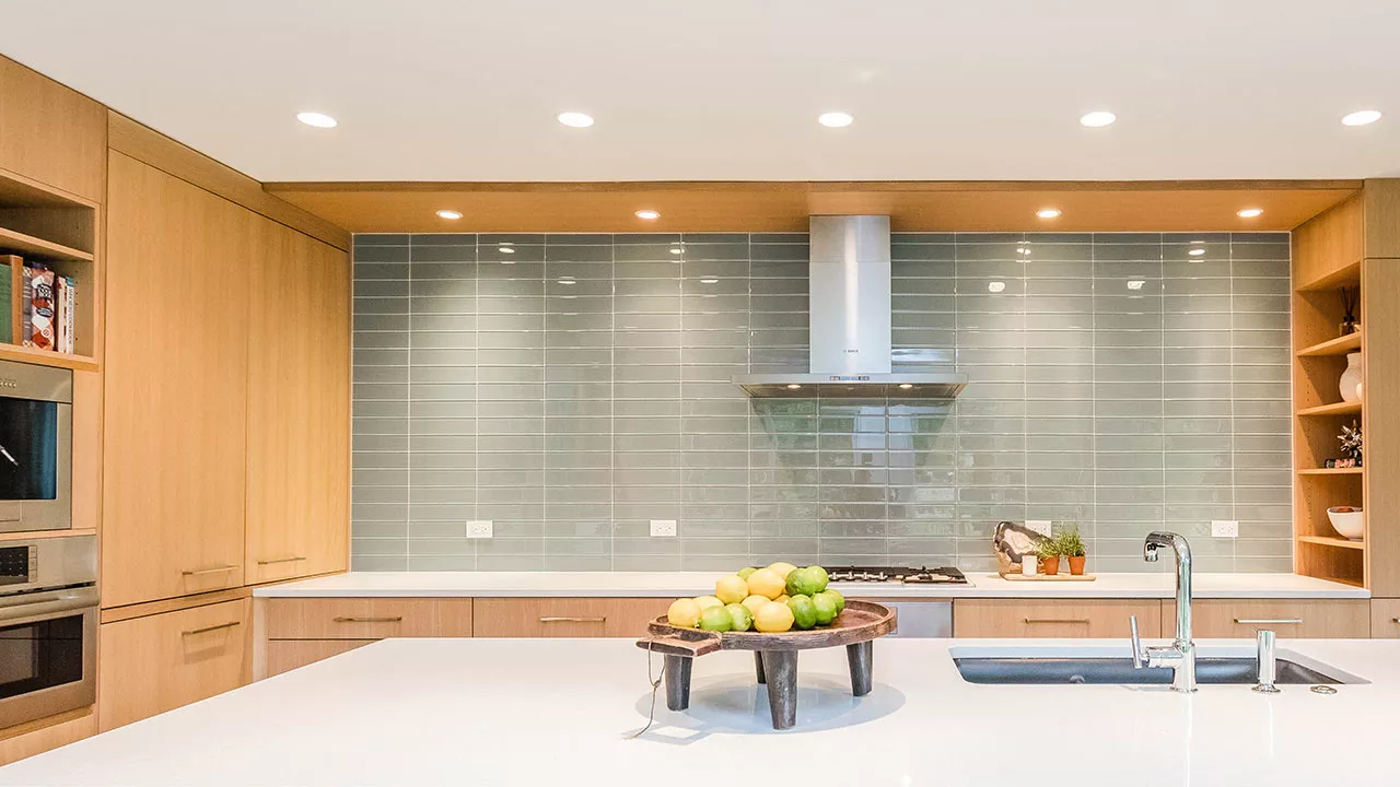 zoom background of a moder kitchen with glass backsplash