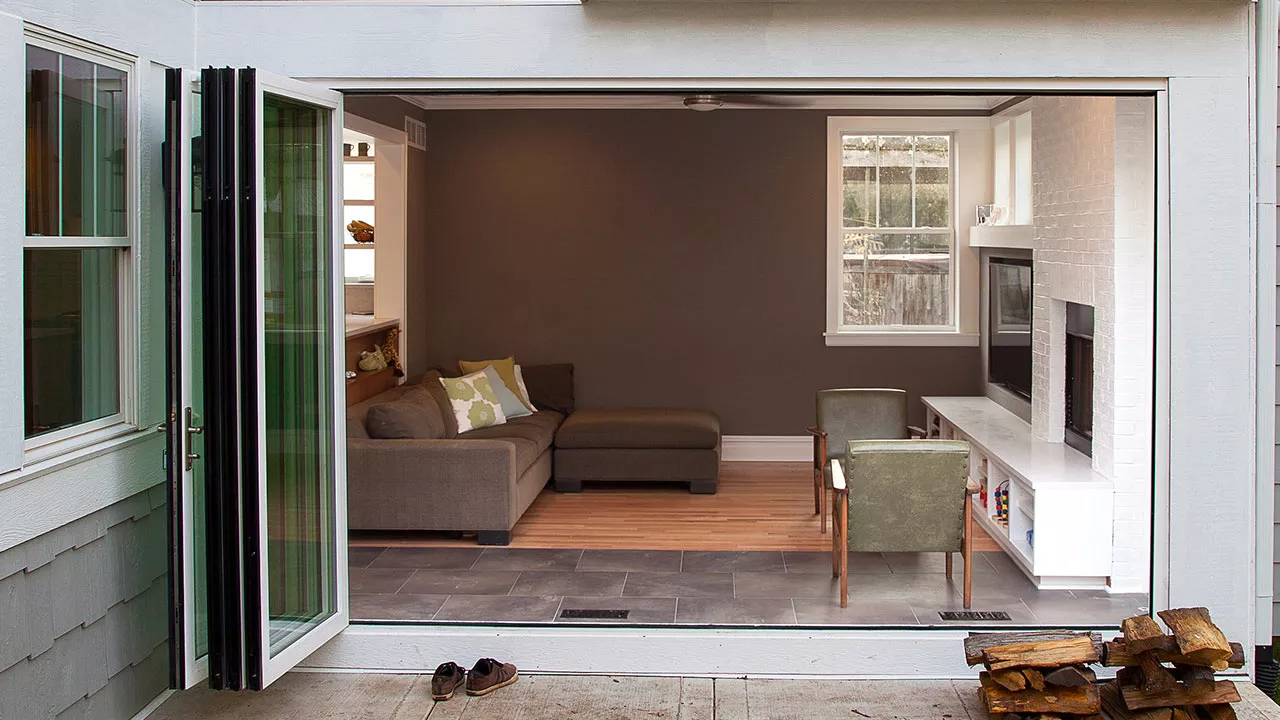 zoom background of a folding door open looking into a family room