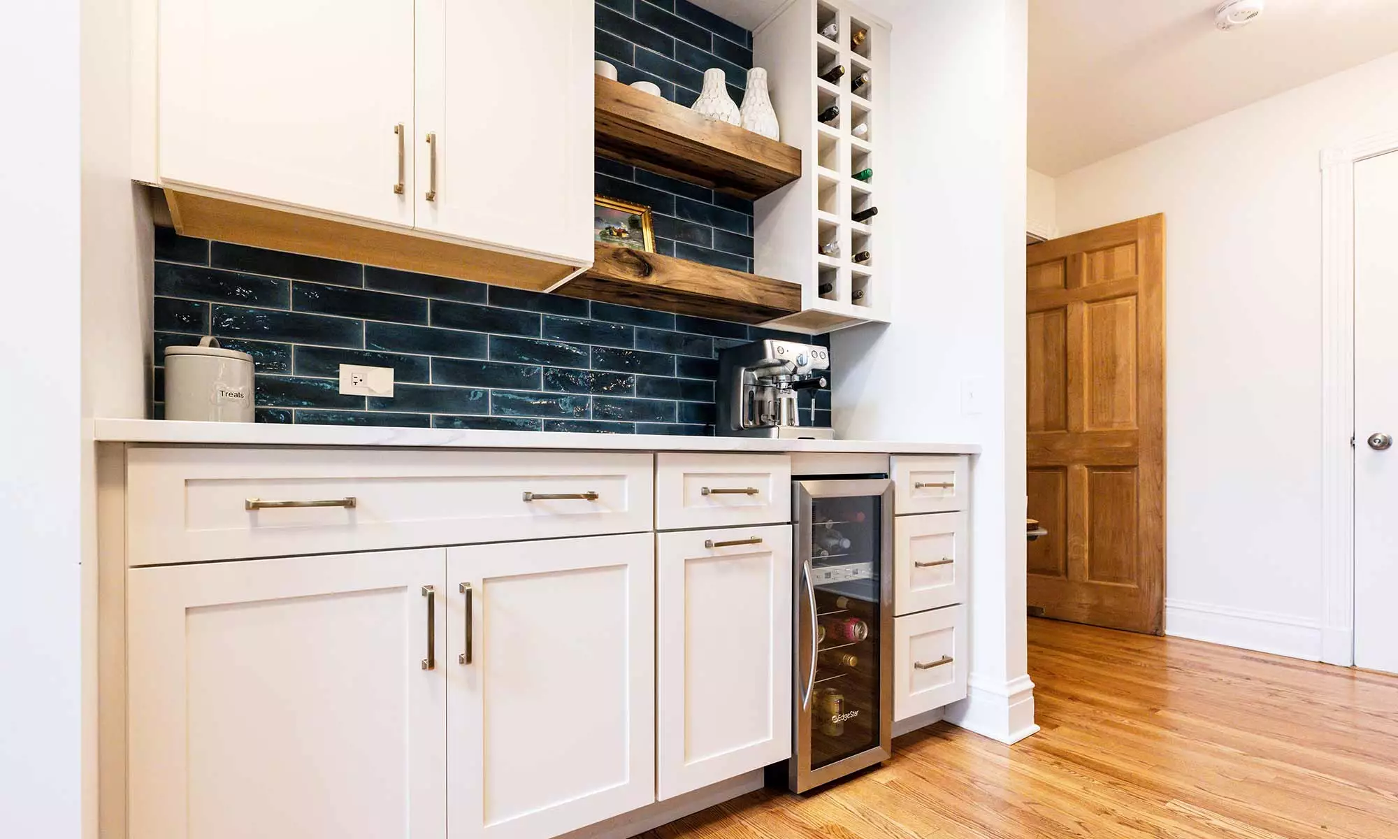 wet bar with blue backsplash tile wine storage built-in cutting board