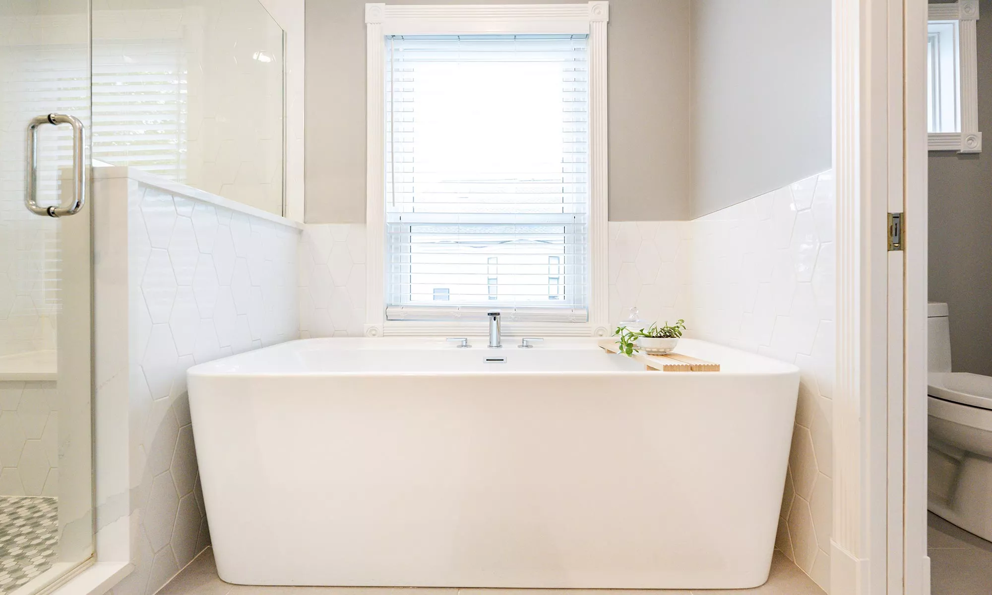 freestanding bathtub in a luxury bathroom remodel