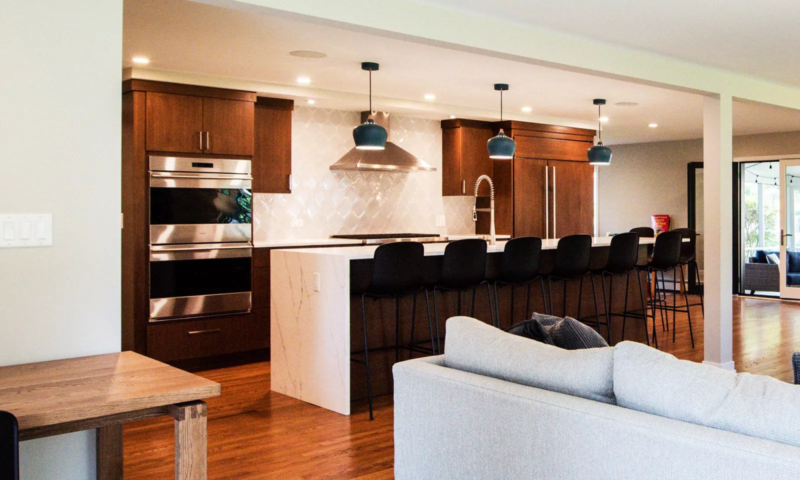 modern hinsdale kitchen remodel with white counters and blue pendant lights