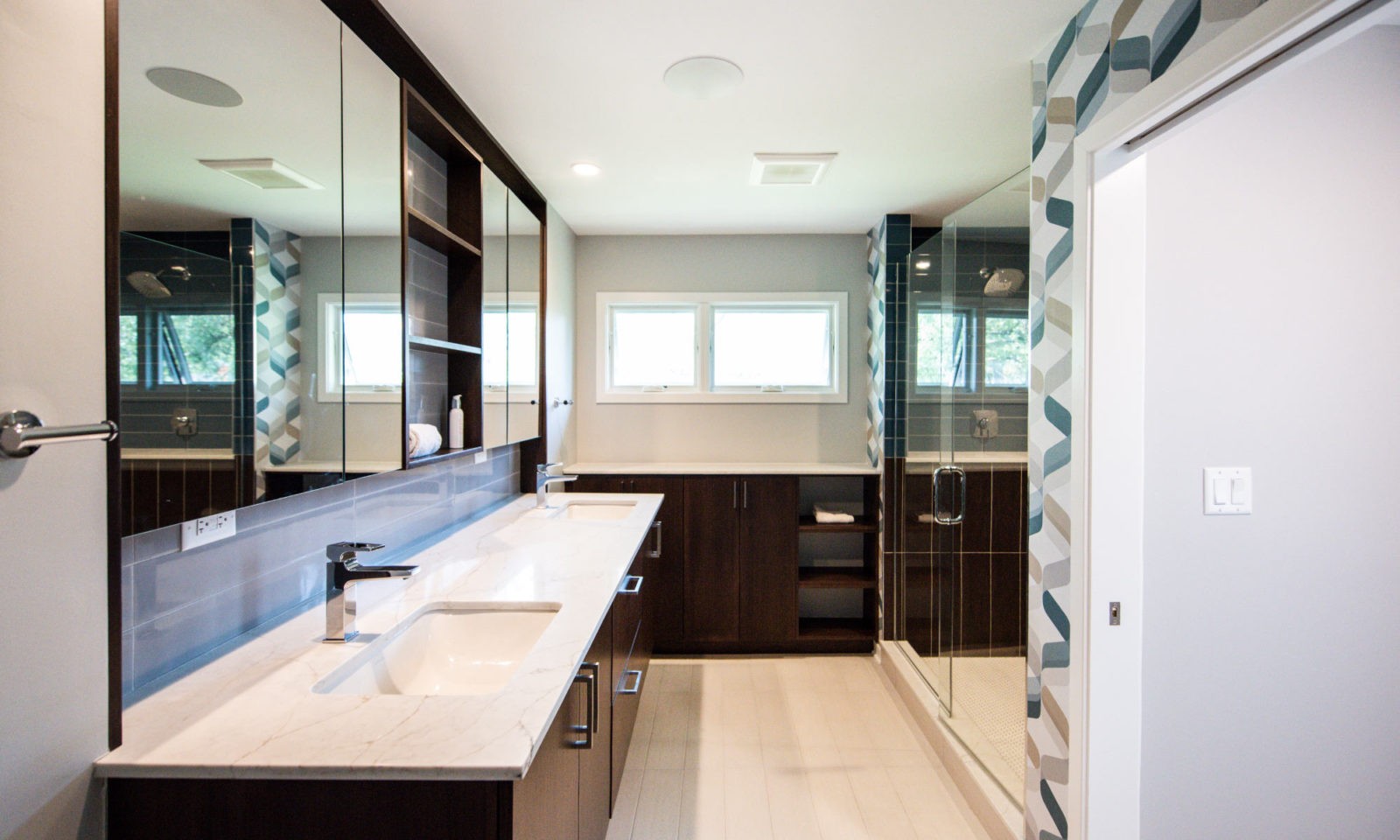 modern master bathroom remodel in hinsdale with walnut medicine cabinets