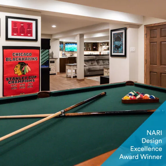award wining title on image of pool table with sports memorabilia