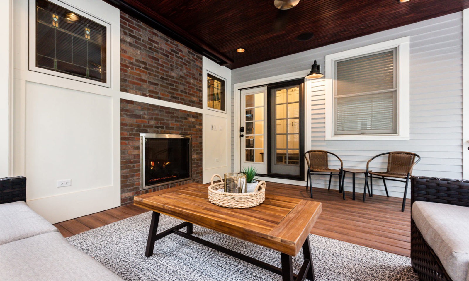 view of fireplace on outdoor living room