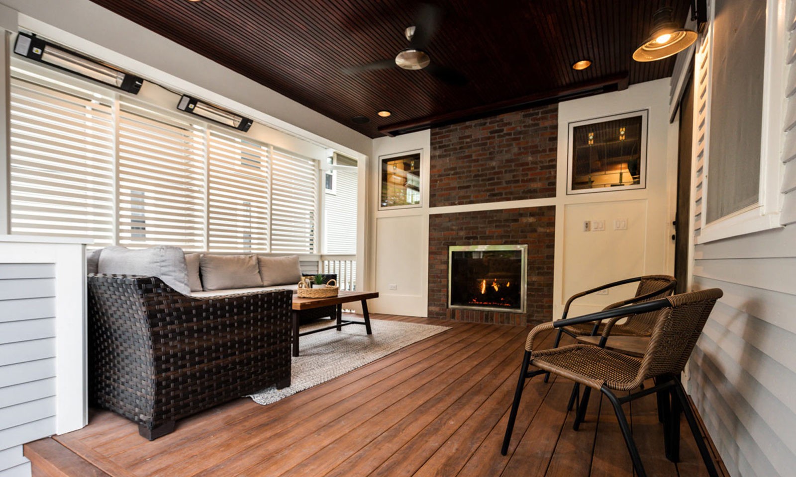 view of fireplace on outdoor living room