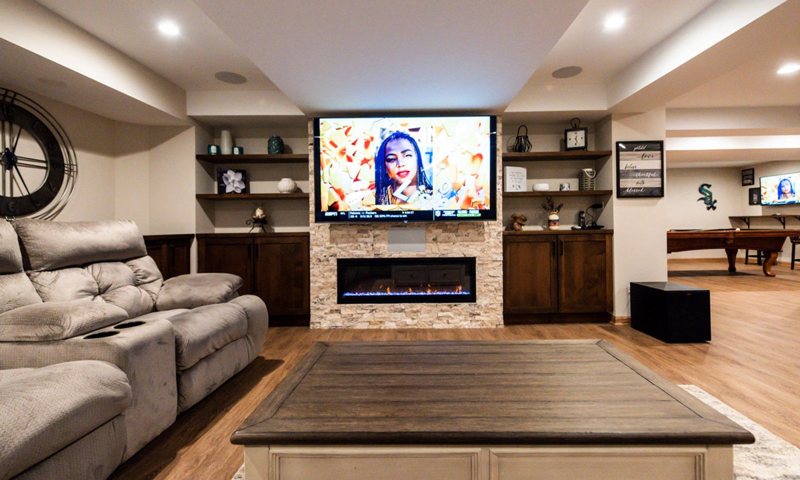 view of TV in basement theatre area