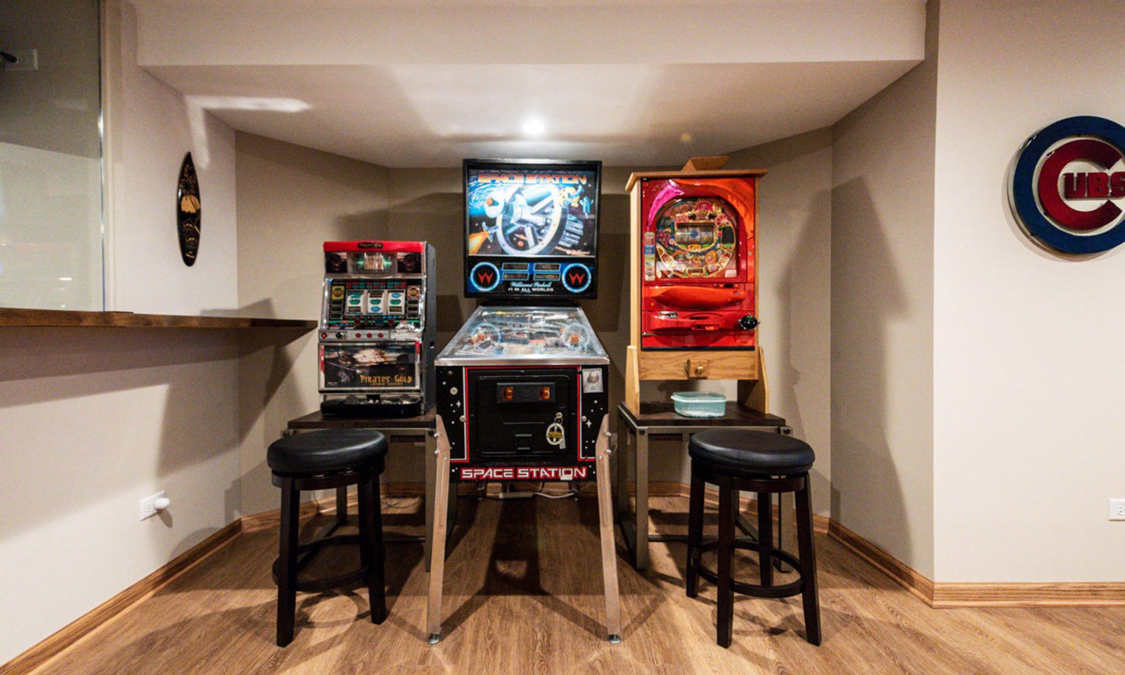 view of pinball and arcade game area in basement remodel