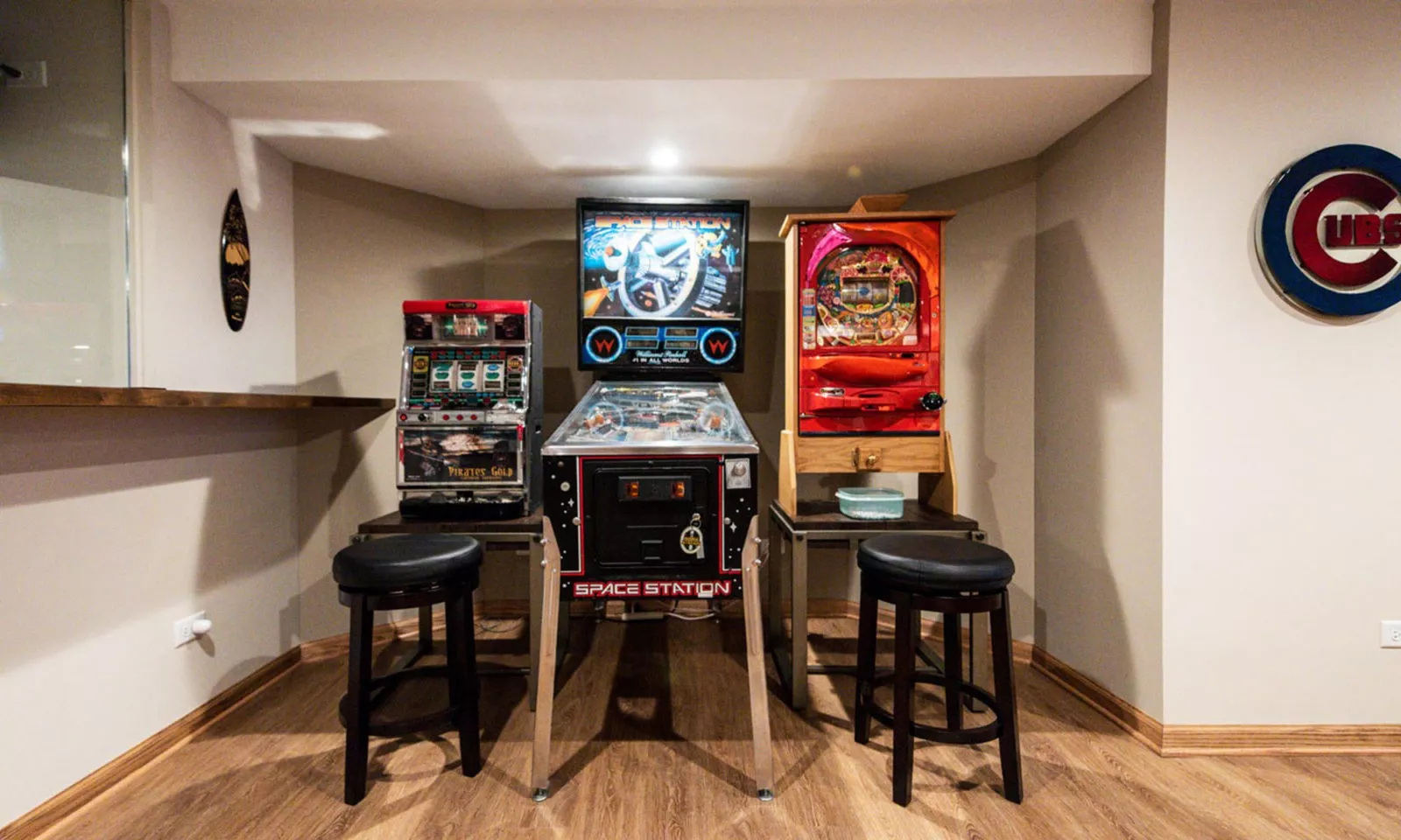 view of pinball and arcade game area in basement remodel