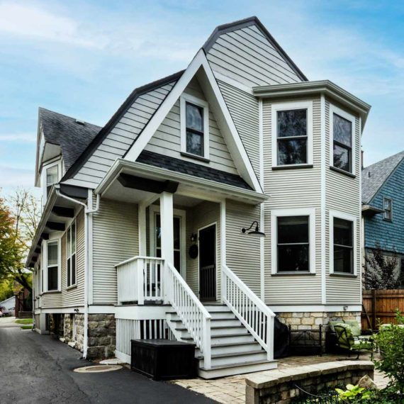 exterior view of vintage victorian second floor primary suite addition