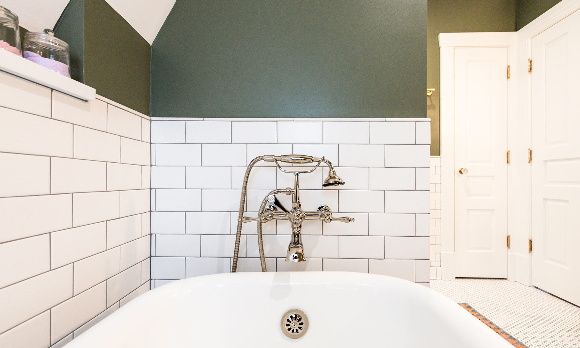 claw-foot tub with chrome plumbing fixtures