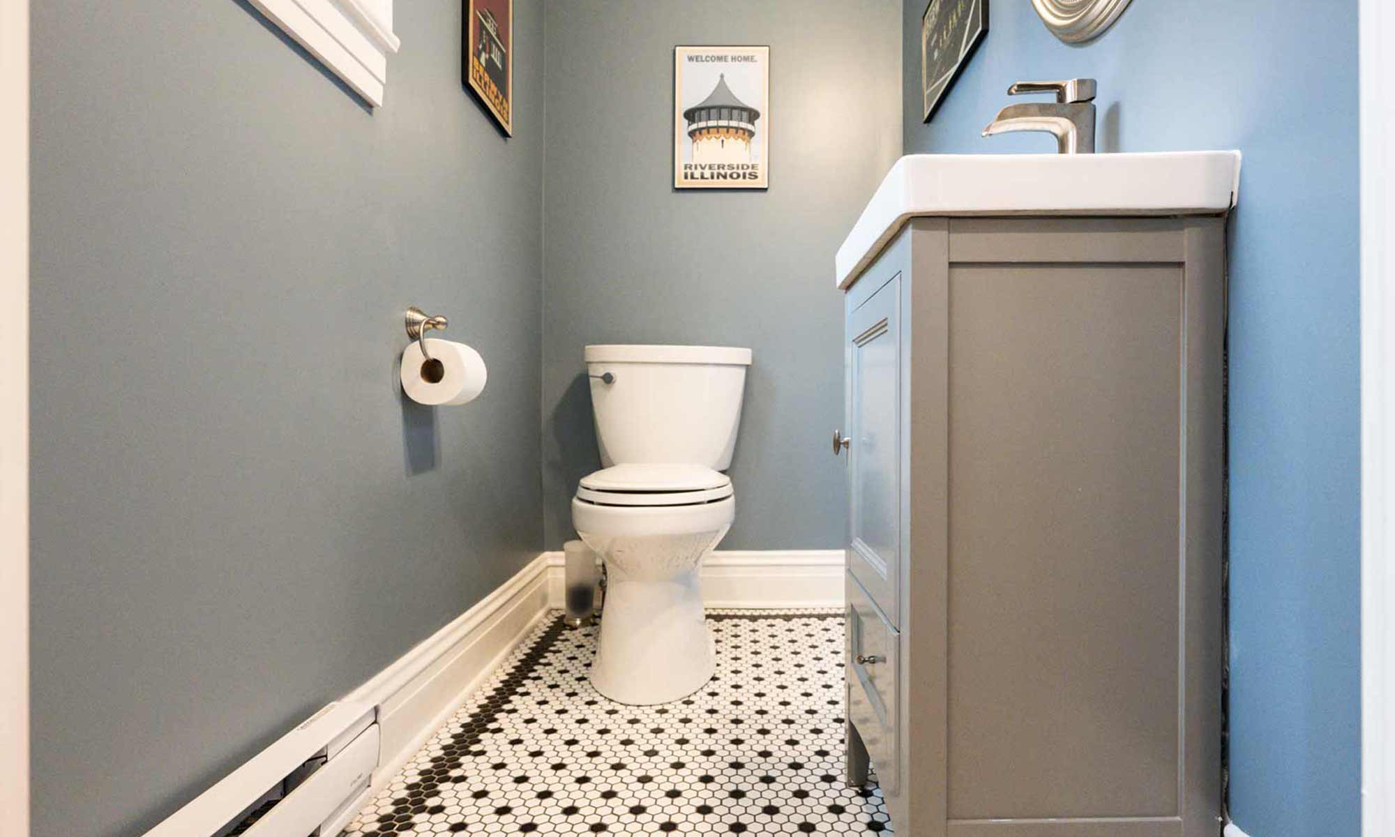 remodeled bathroom with mosaic tile floor