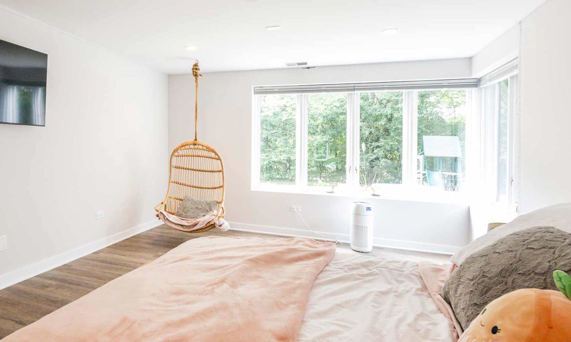 swing hanging from ceiling in remodeled kids bedroom