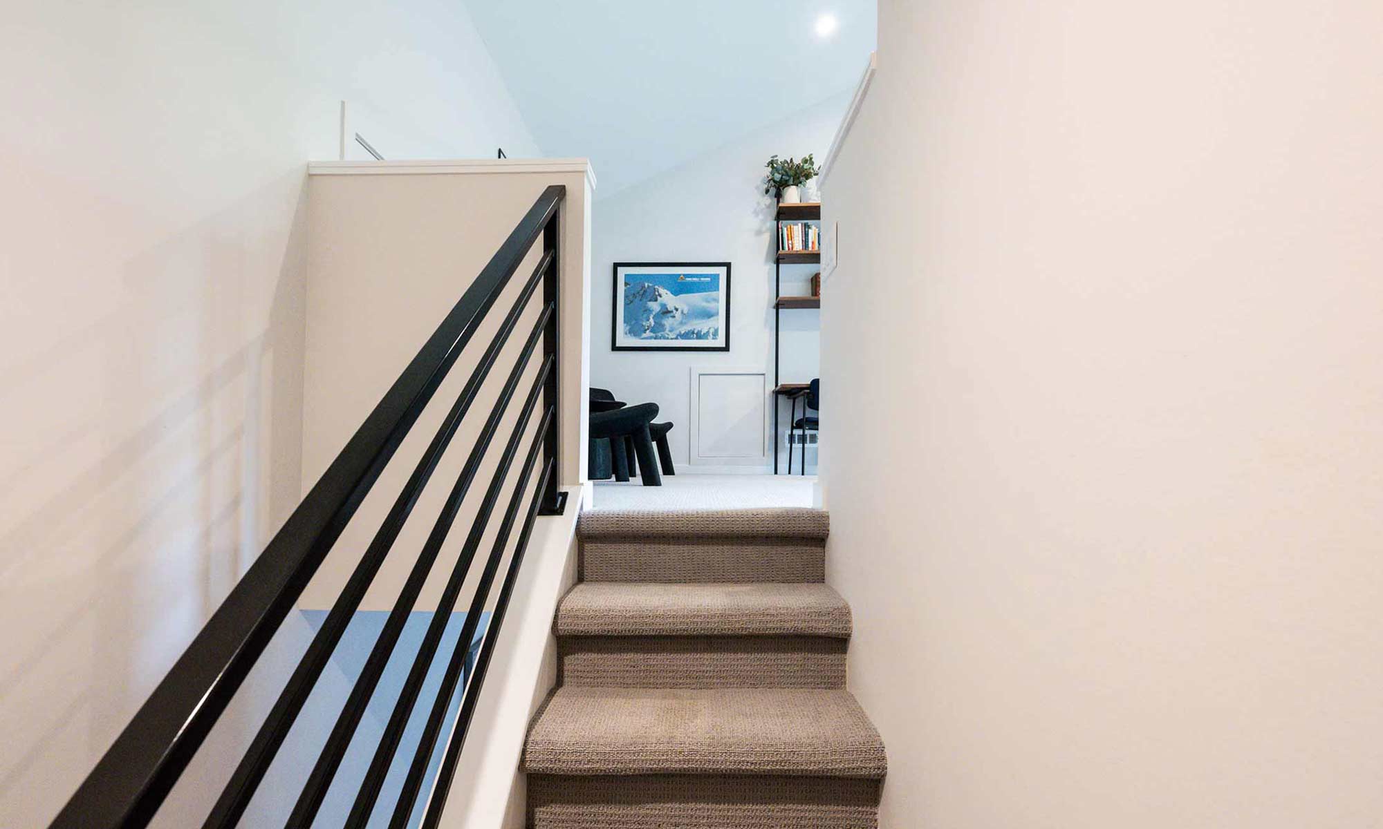 interior view of modern stairway in an MCM home office addition