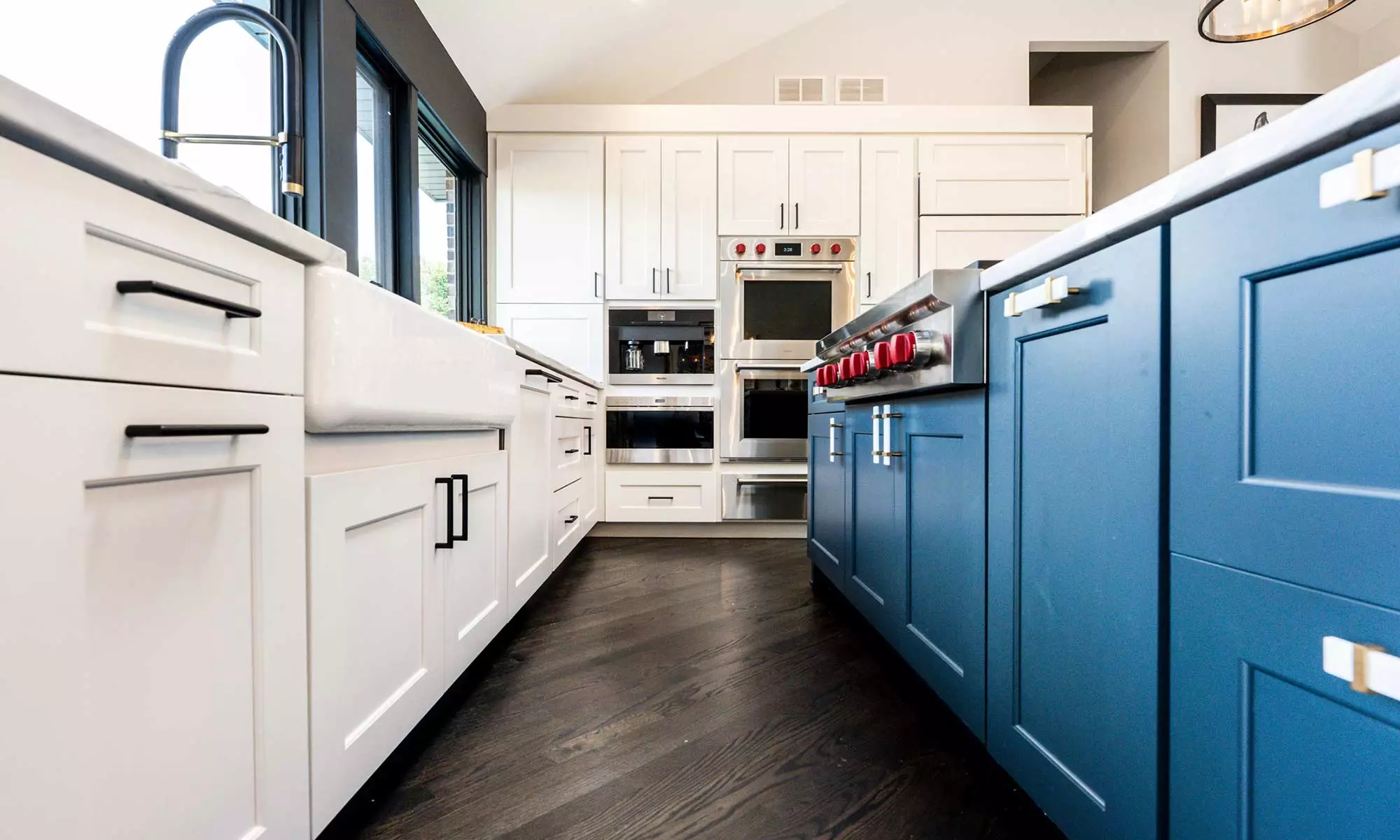 luxury kitchen remodel with blue island