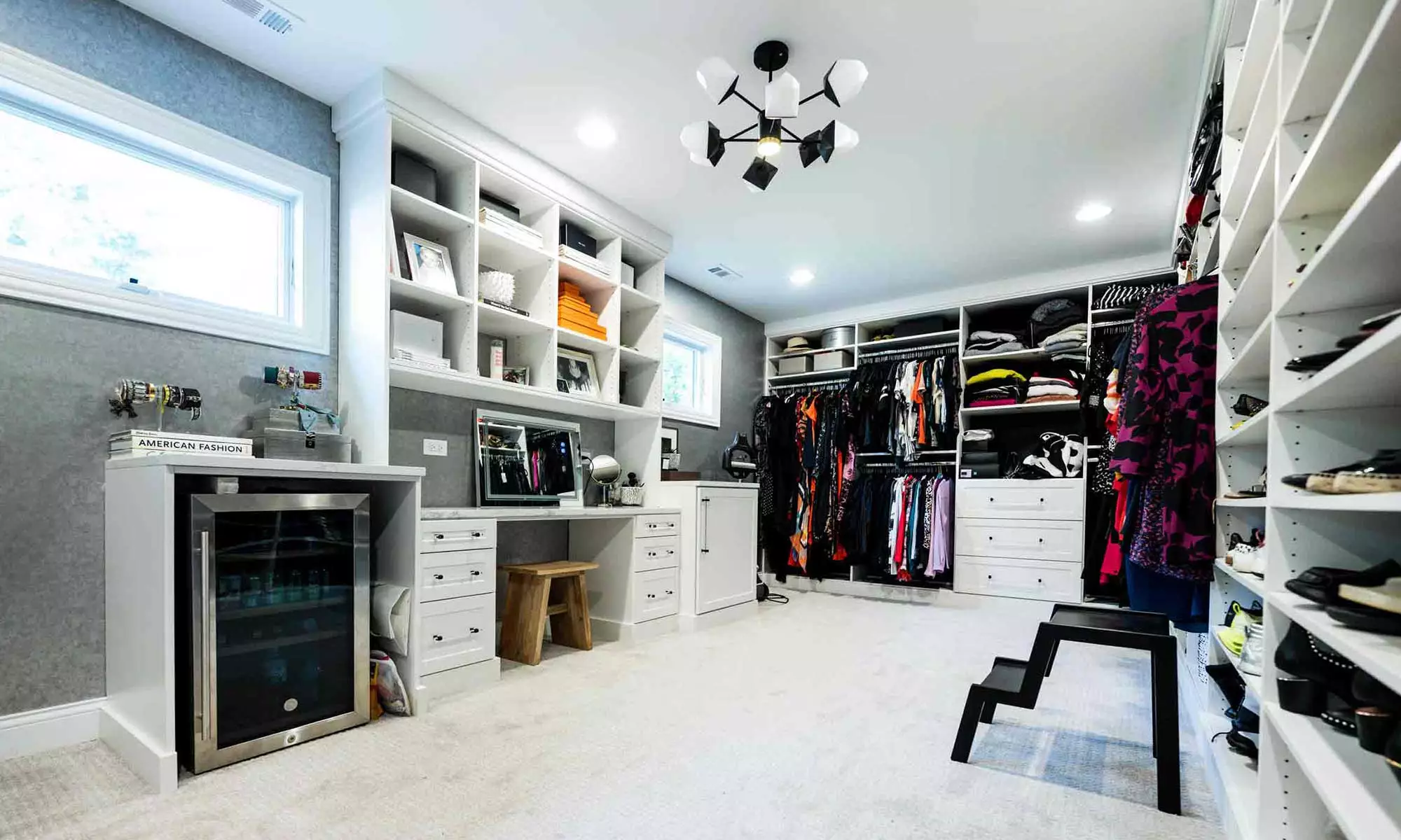 built-in makeup desk in large luxury closet