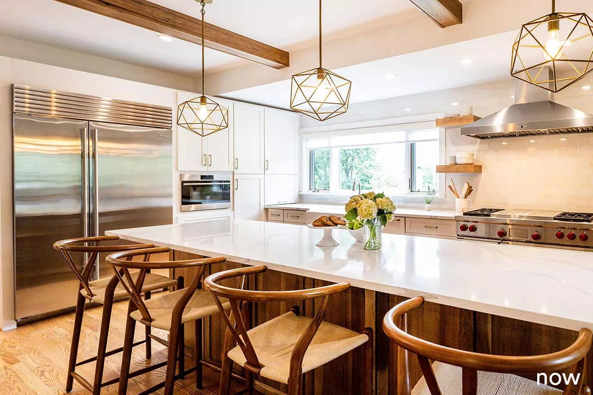 liv companies large kitchen renovation white cabinets exposed beams geometric lighting