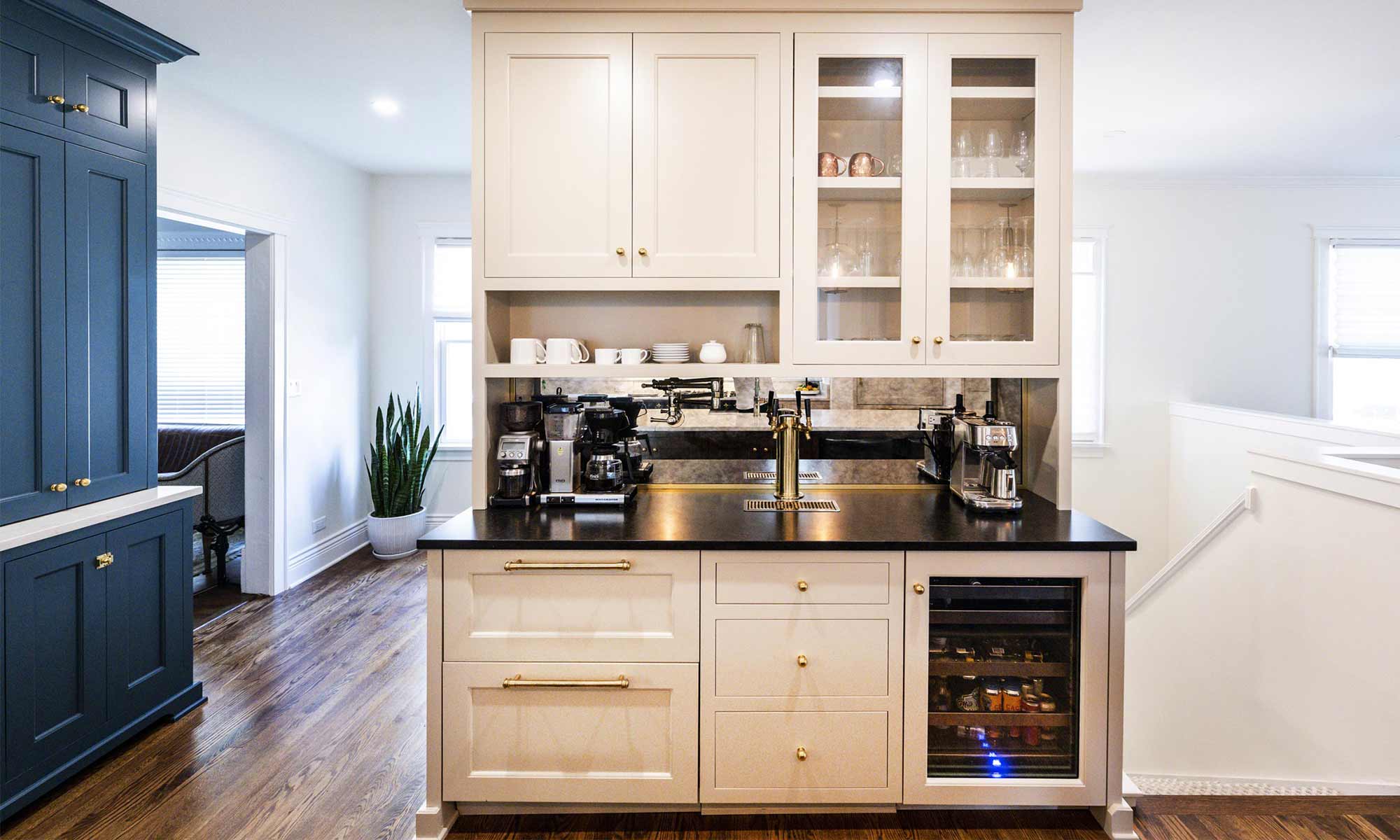 custom beverage bar with cold brew tap, beverage fridge, glass doors, and open shelf