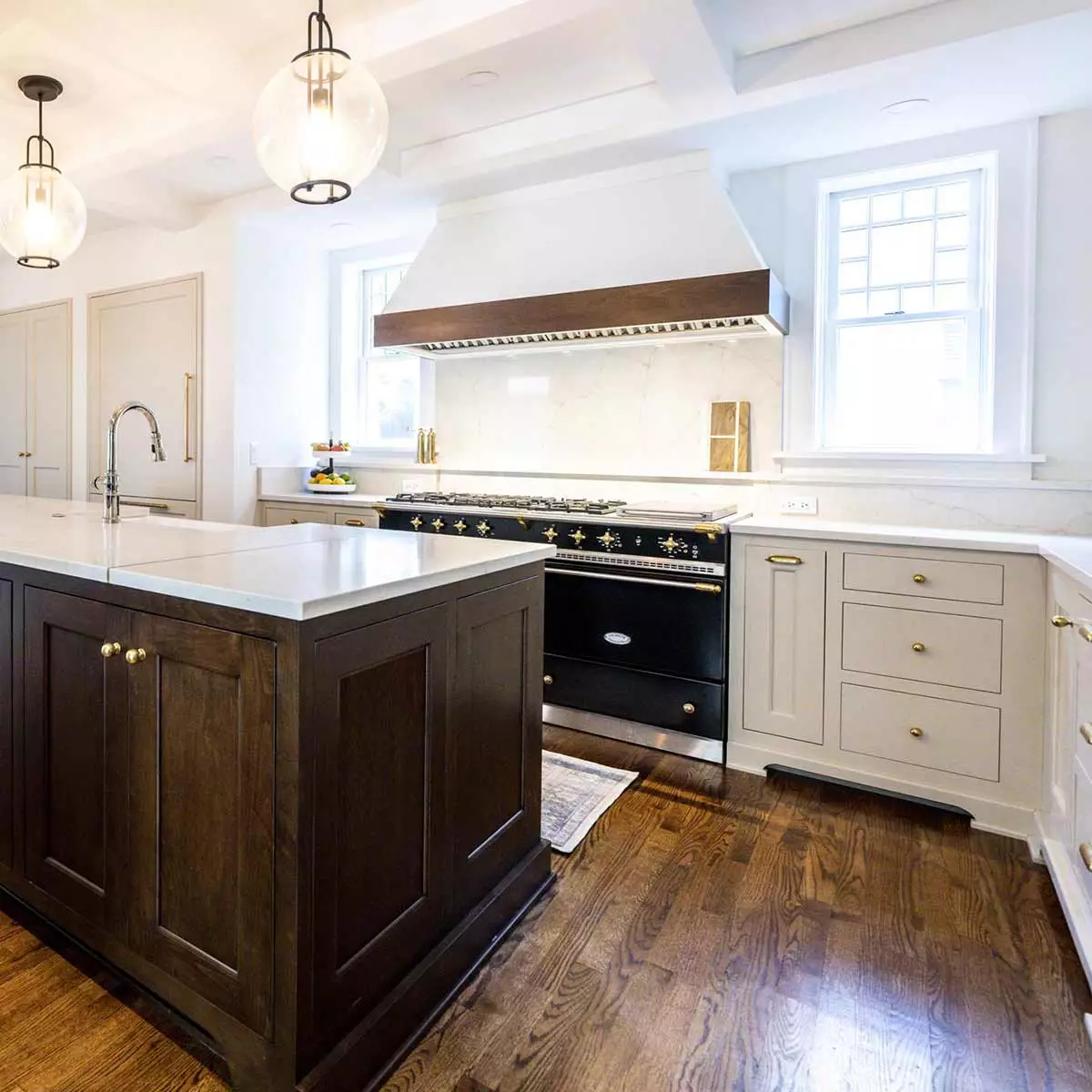 luxury kitchen remodel with walnut island and 60" french range