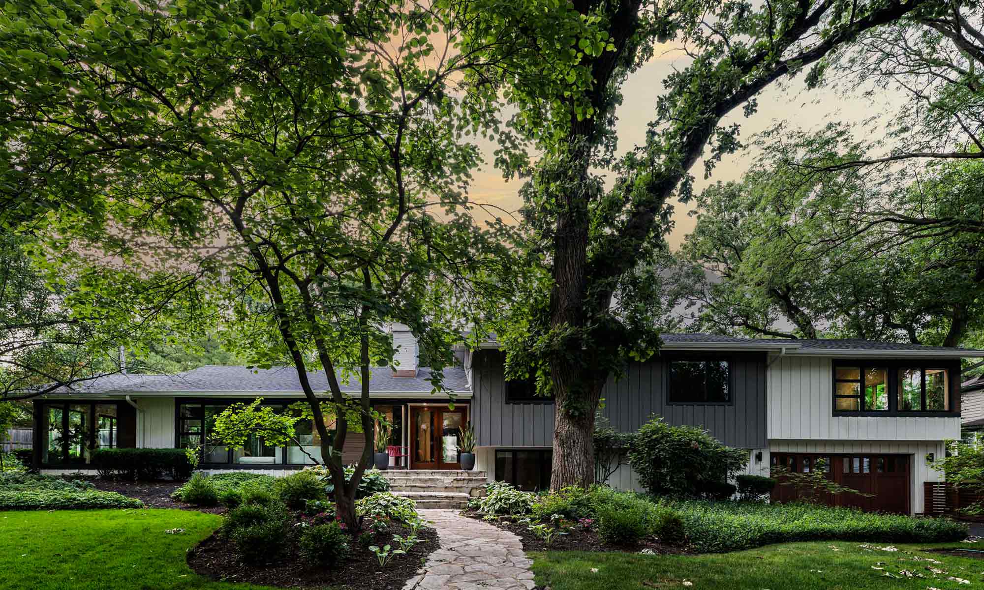 modern exterior remodel with ipe siding and large windows in hinsdale, illinois