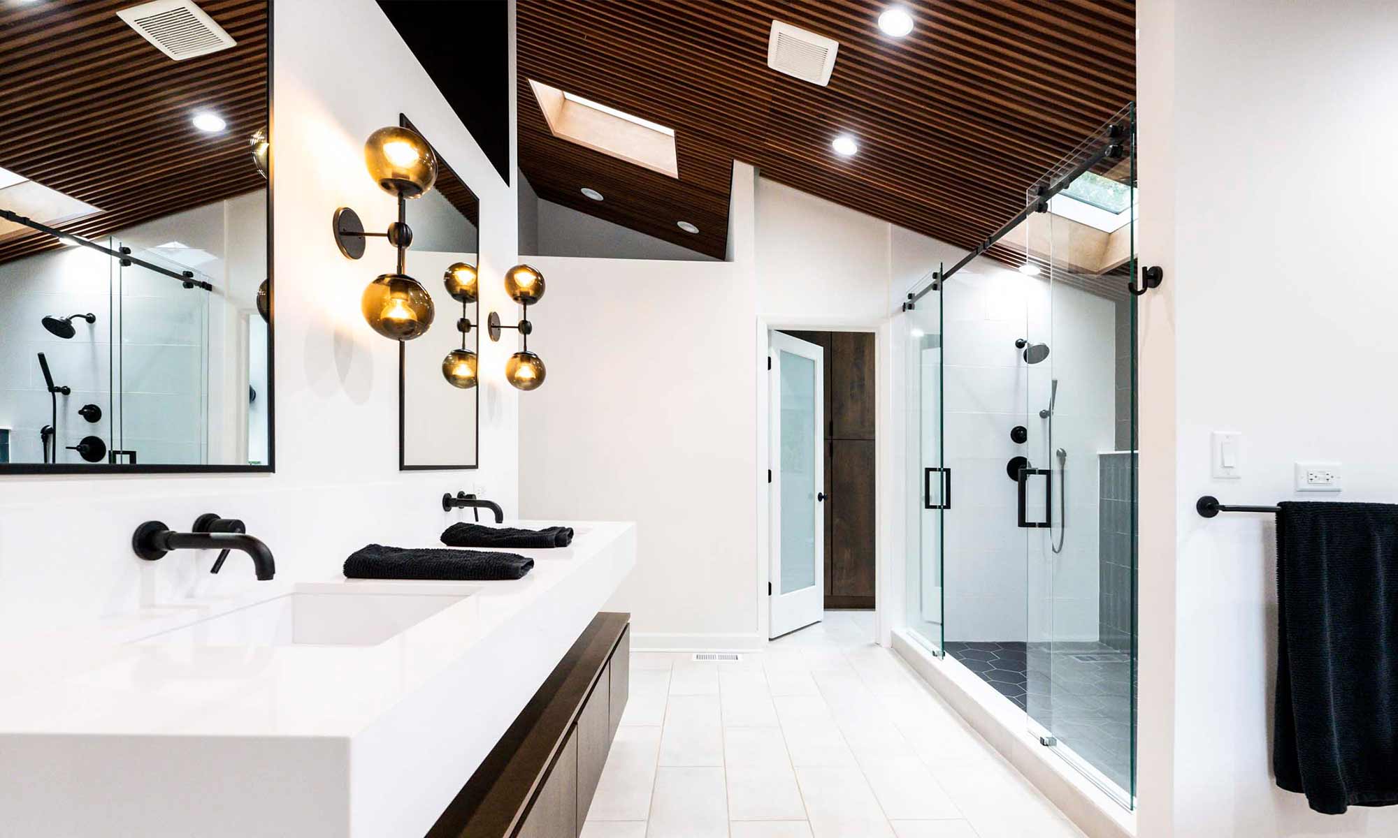 luxury California style modern bathroom remodel by LivCo in Hinsdale Illinois with wood ceiling