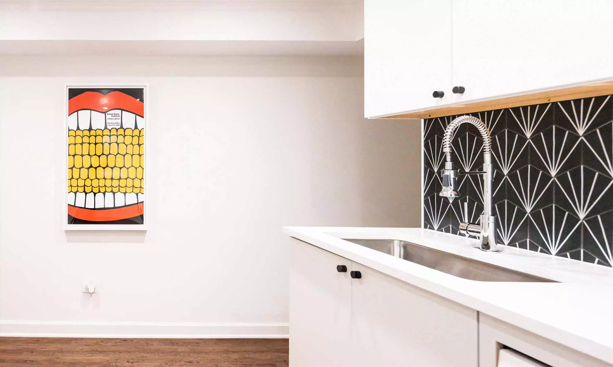 modern laundry room remodel with patterned backsplash tile