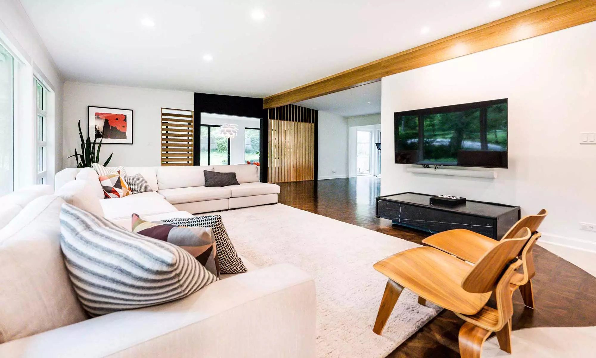 modern family room remodel with wood beam and louver wall in hinsdale, illnois