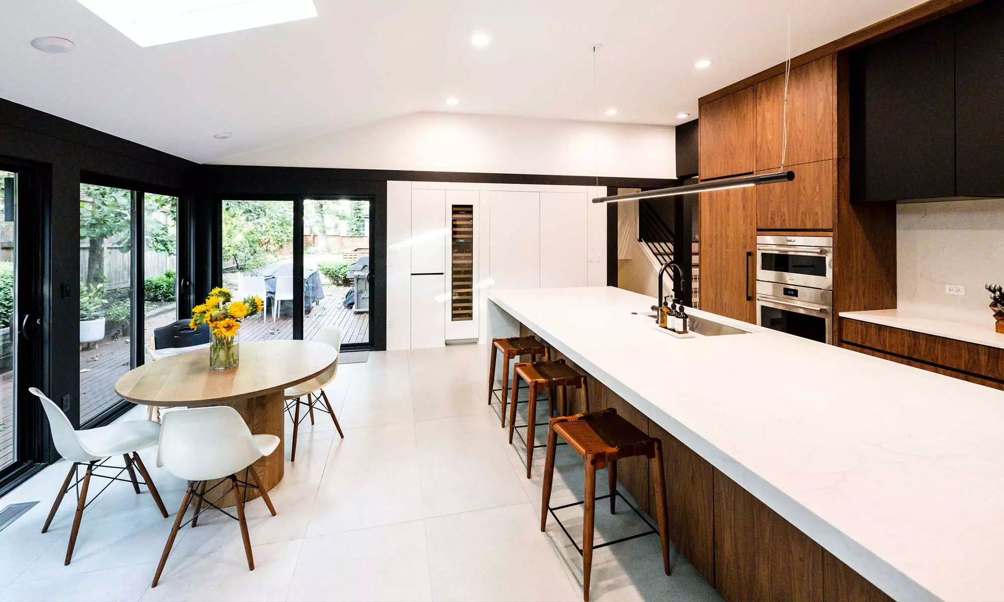 modern kitchen remodel looking out to backyard through sliding doors in hinsdale, illinois