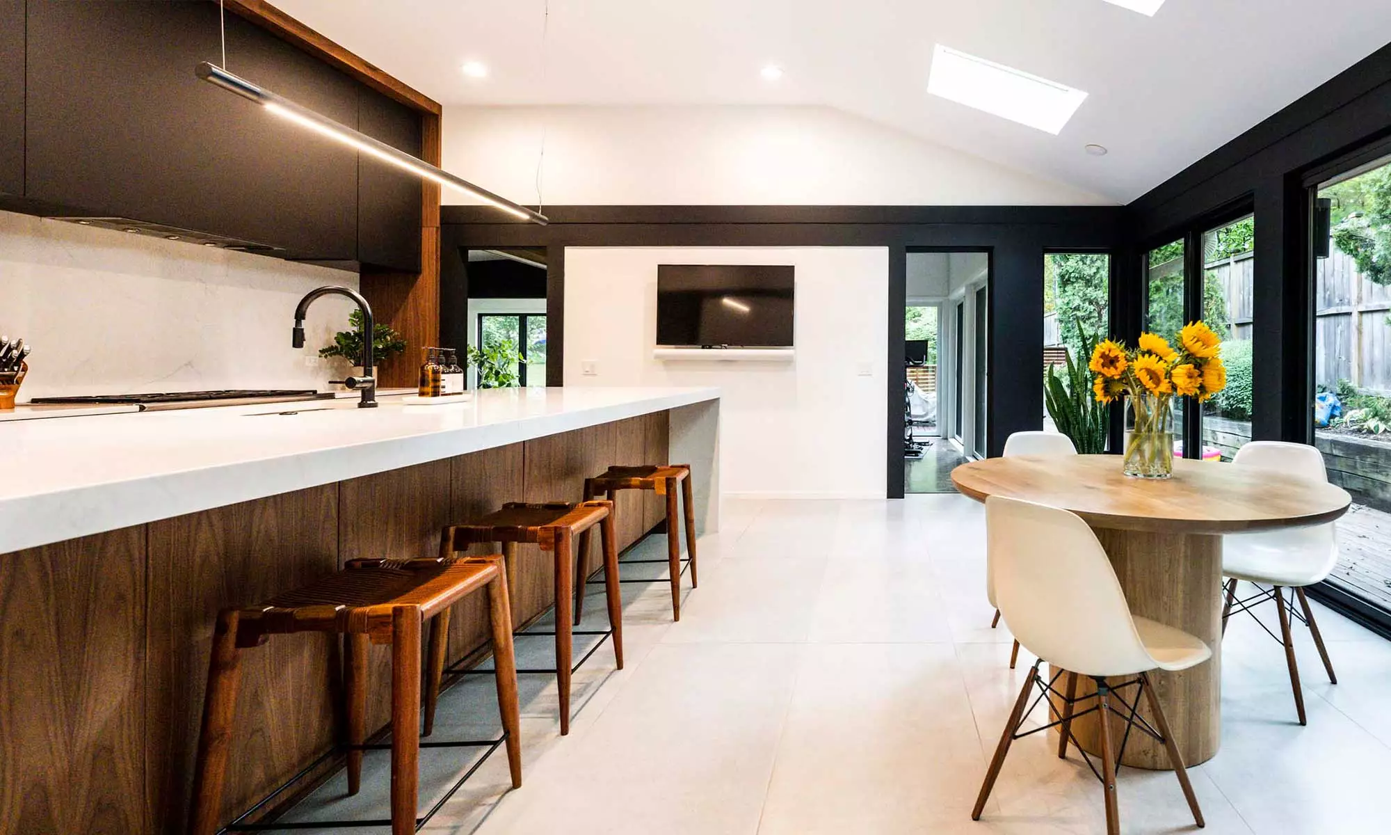 modern kitchen remodel looking out to backyard through sliding doors in hinsdale, illinois