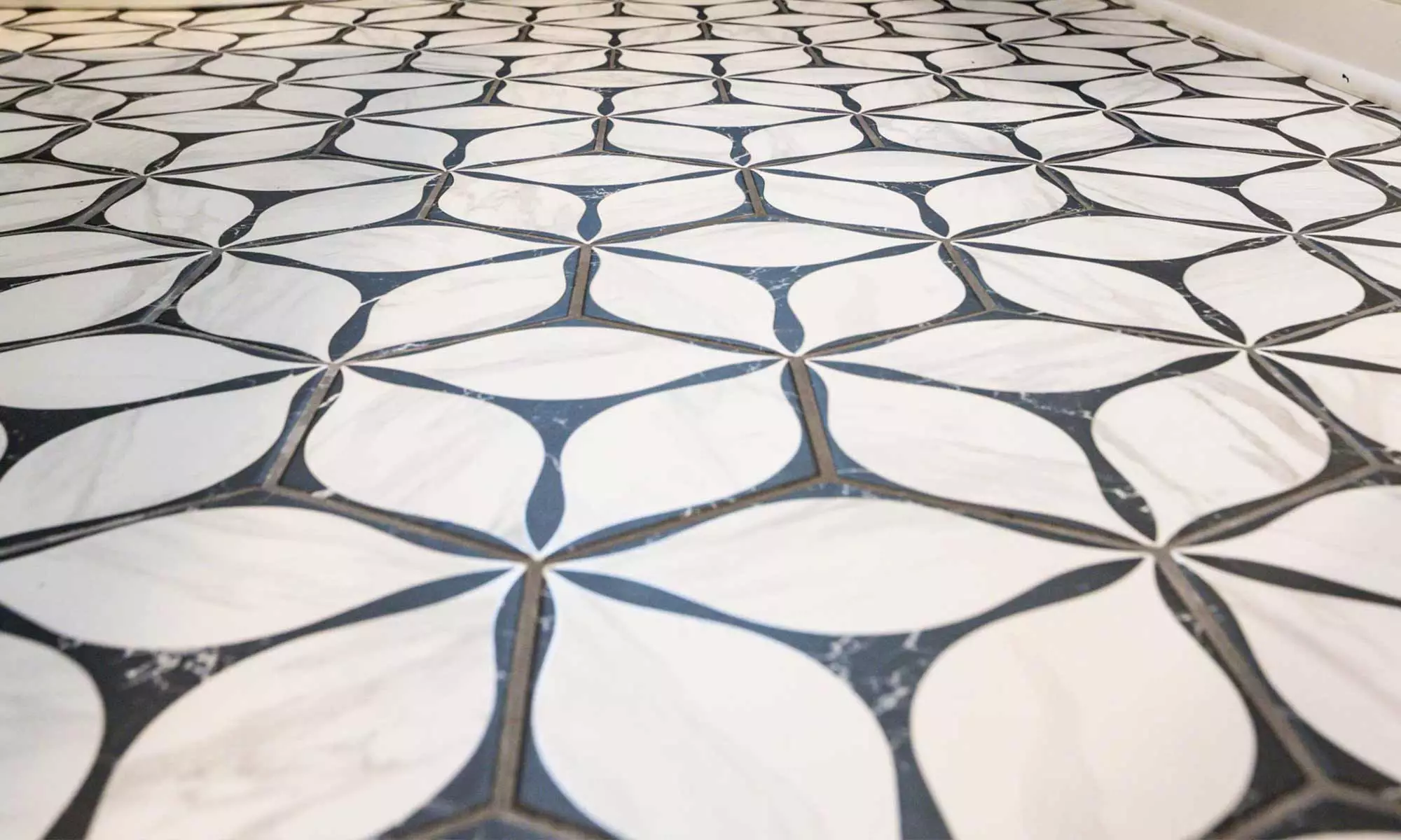 flower pattern tile floor in luxury bath remodel