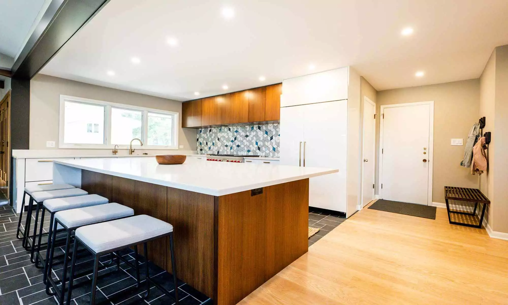 modern luxury kitchen remodel with walnut island and gloss white cabinets