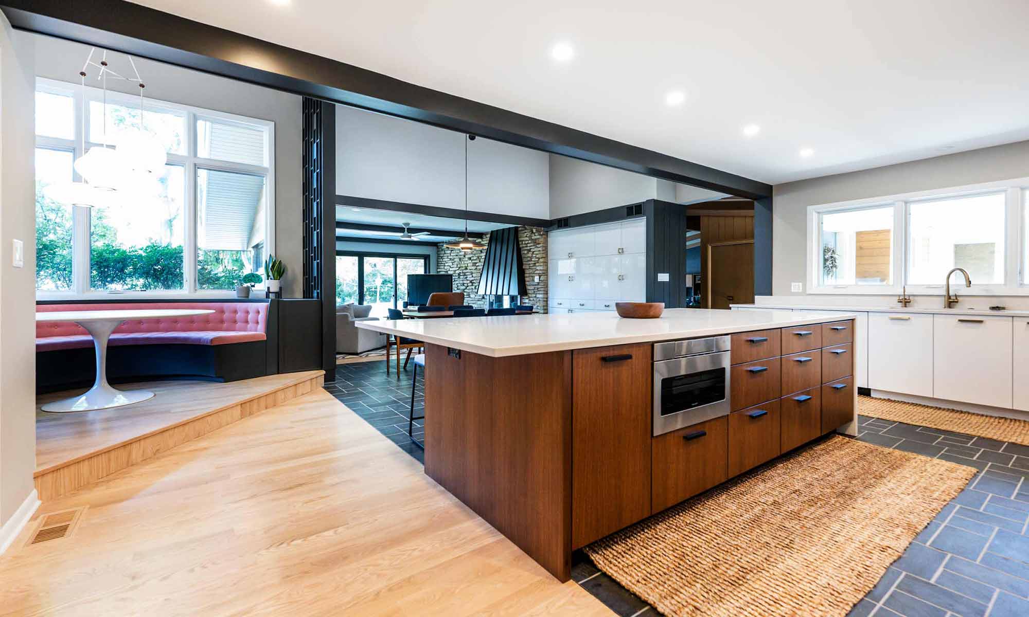 view of walnut island in luxury mid century kitchen remodel