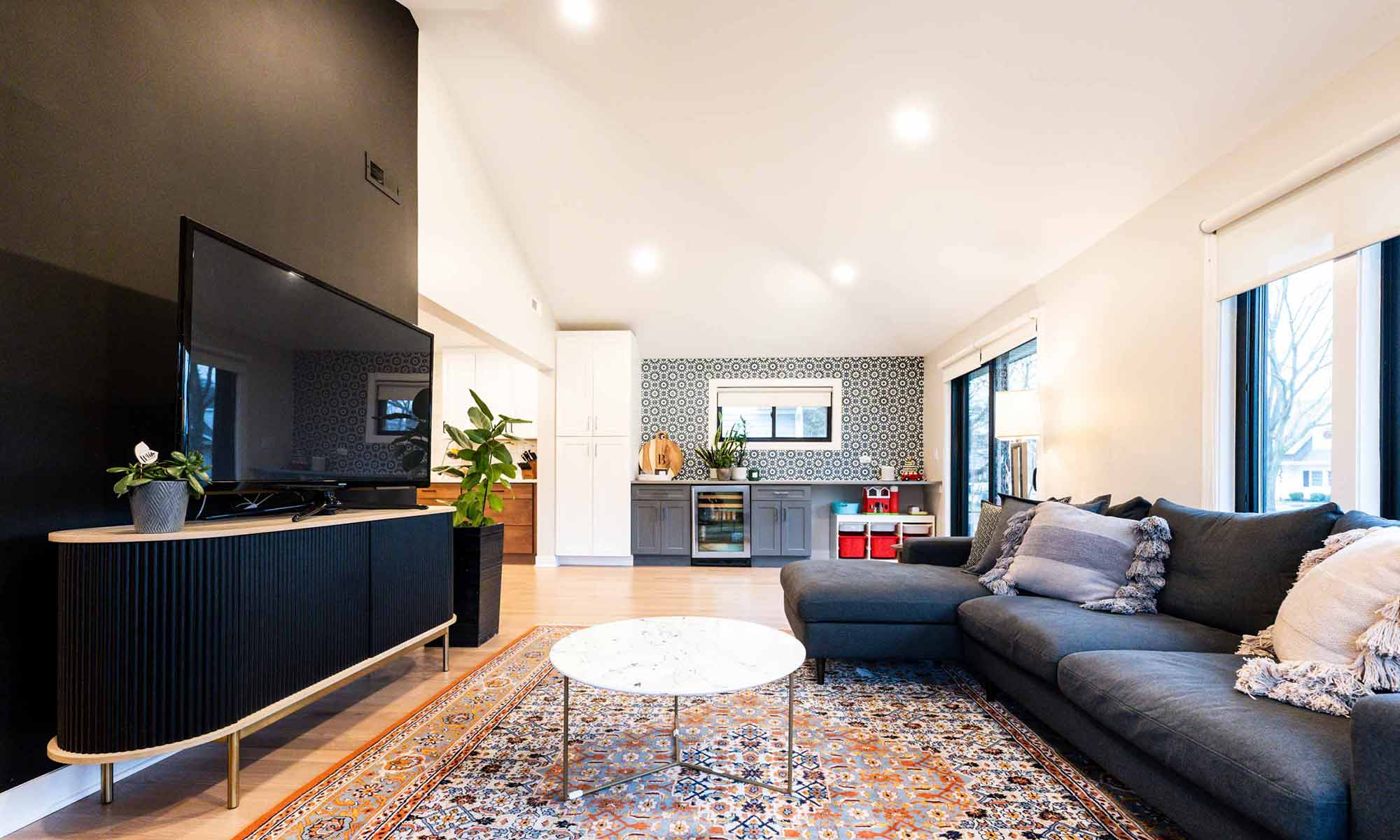 view of family room and bar area in modern western springs remodel and addition