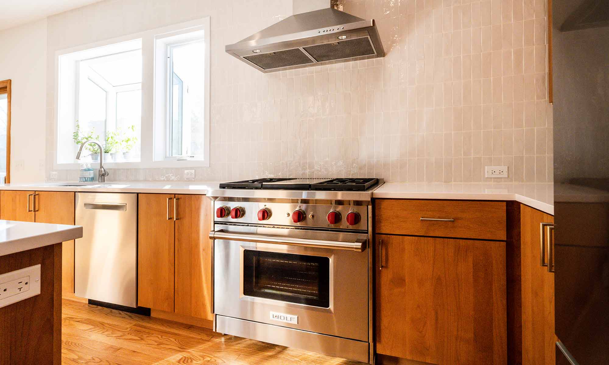 stainless steel wolf range in wheaton whole house remodel with cherry cabinets