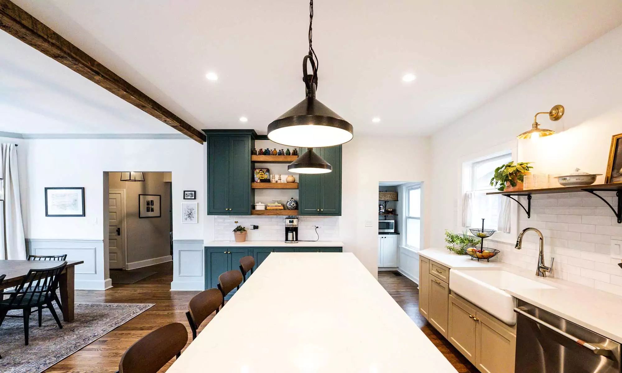 dark wood kitchen island with blue white and beige perimeter cabinetry in la grange park Illinois vintage kitchen remodel