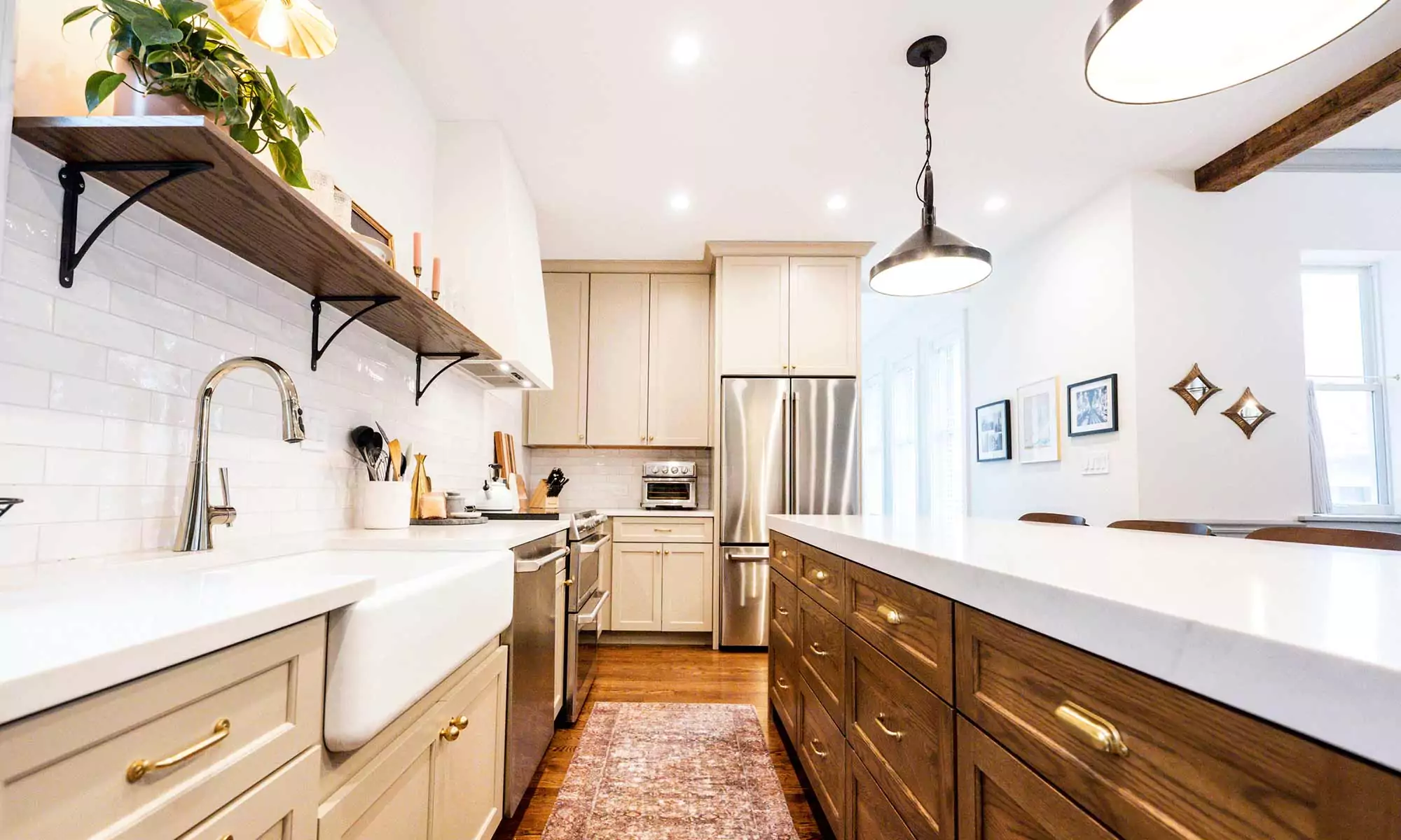 dark wood kitchen island with blue white and beige perimeter cabinetry in la grange park Illinois vintage kitchen remodel